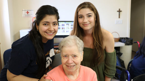 Two female students pose for SJC's 2017 Day of Service at The Sister's of St. Joseph's motherhouse located in Brentwood Long Island.