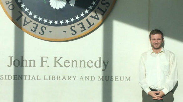 Newman Fellow Student standing at museum