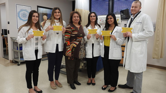 SJC Long Island nursing students with department chair Maria Fletcher, Ph.D.