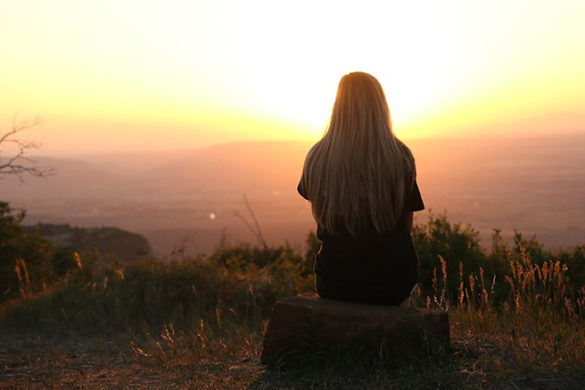 Girl watching sunset.