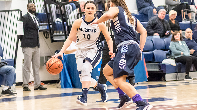 Female basketball player in action.