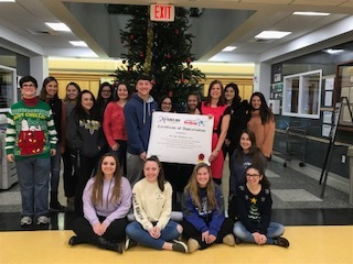 Debra Zaech's SJC 100 class with their certificate from the Guide Dog Foundation.