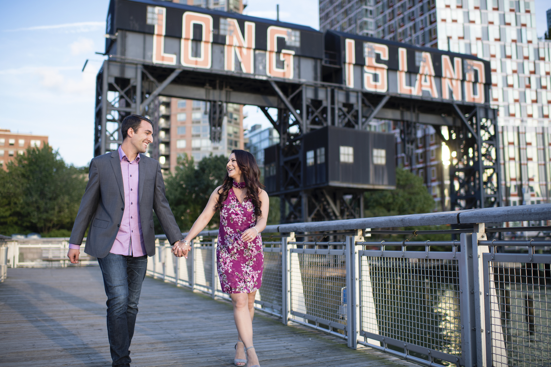 Deutsch and Sabatello holding hands while walking.