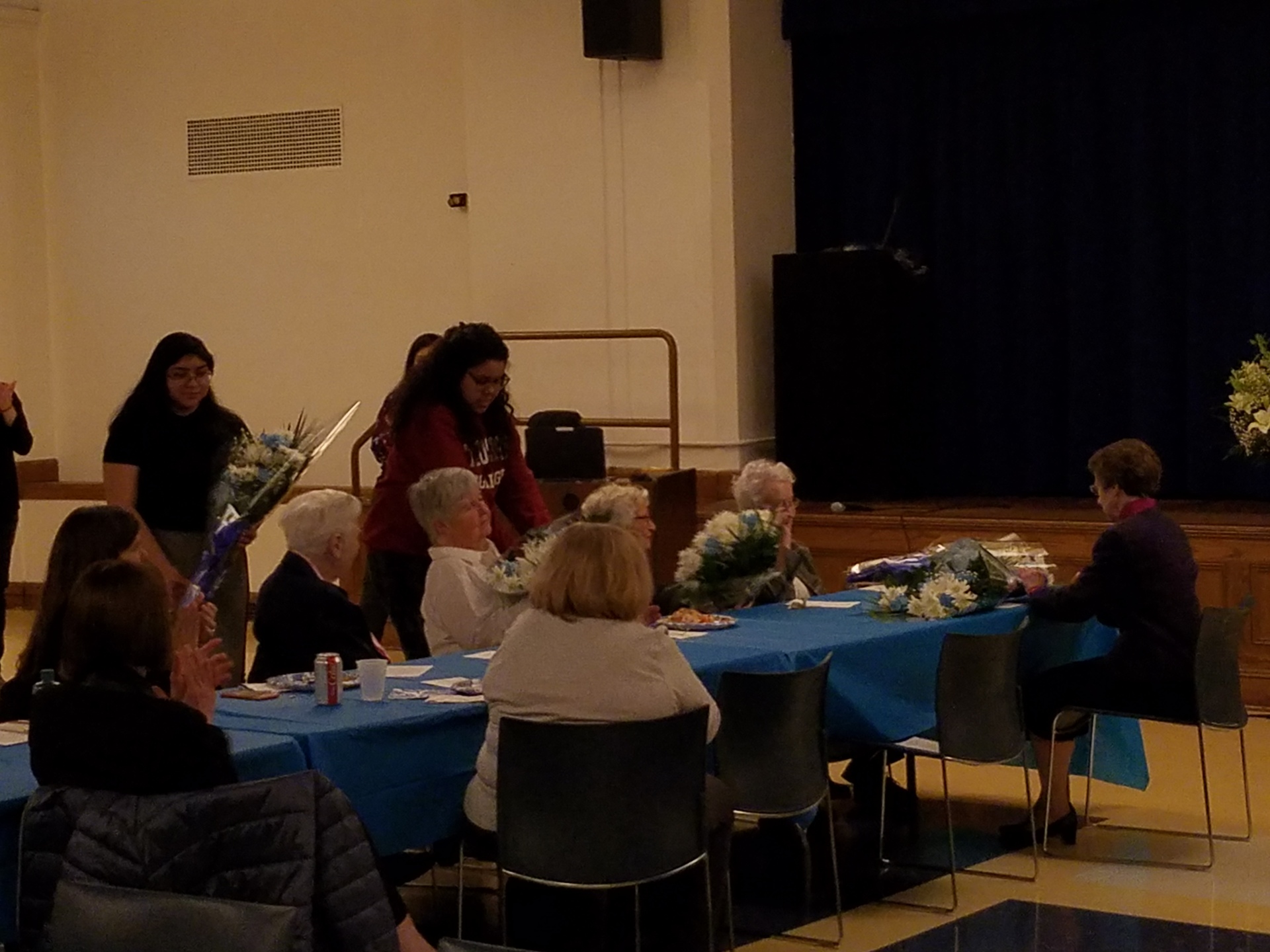 SJC Brooklyn sisters receive their flowers.