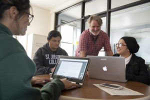 Professor with students. 