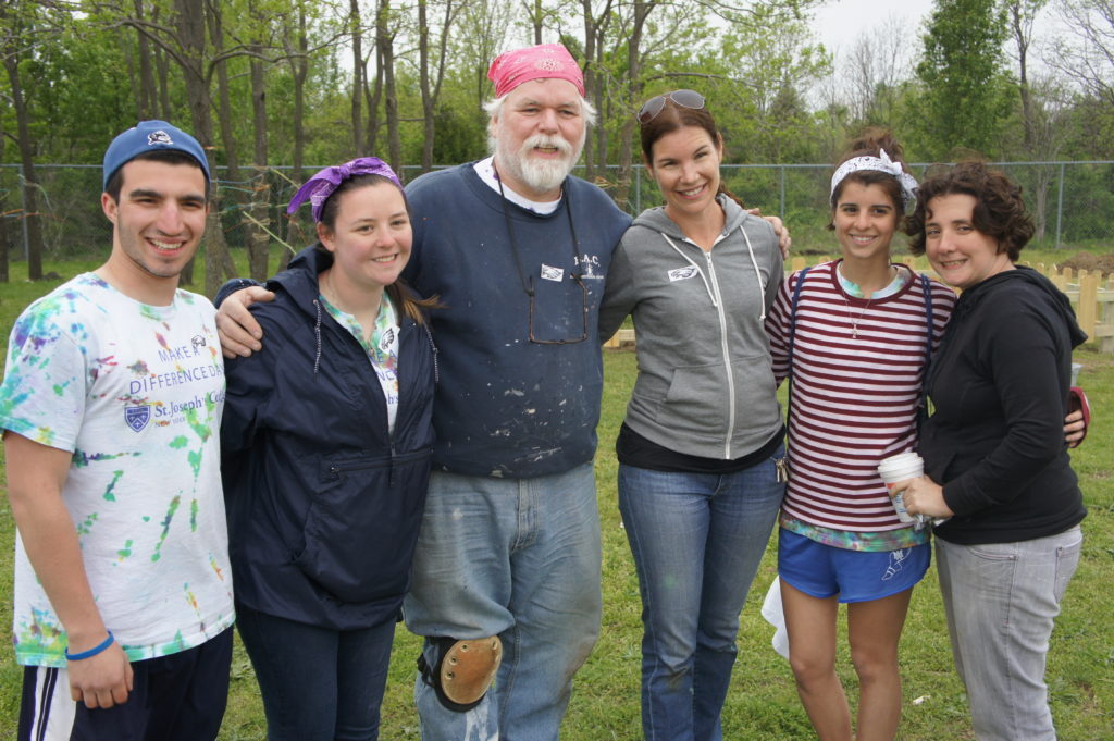 Pat Tracy with SJC students. 