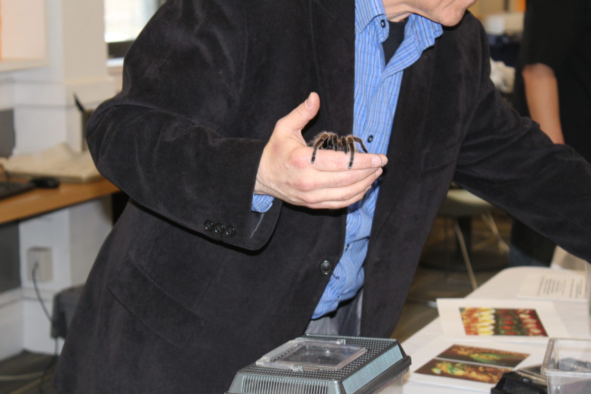 Sorkin holding a tarantula.