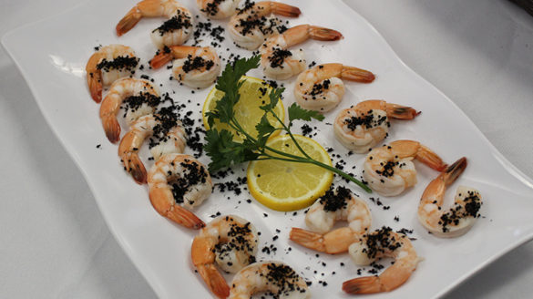 Shrimp coated in black ants.