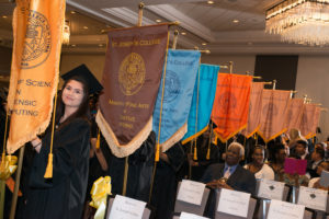 Students at college commencement. 