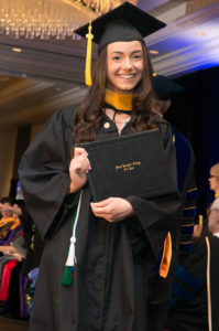 Female college student at graduation. 