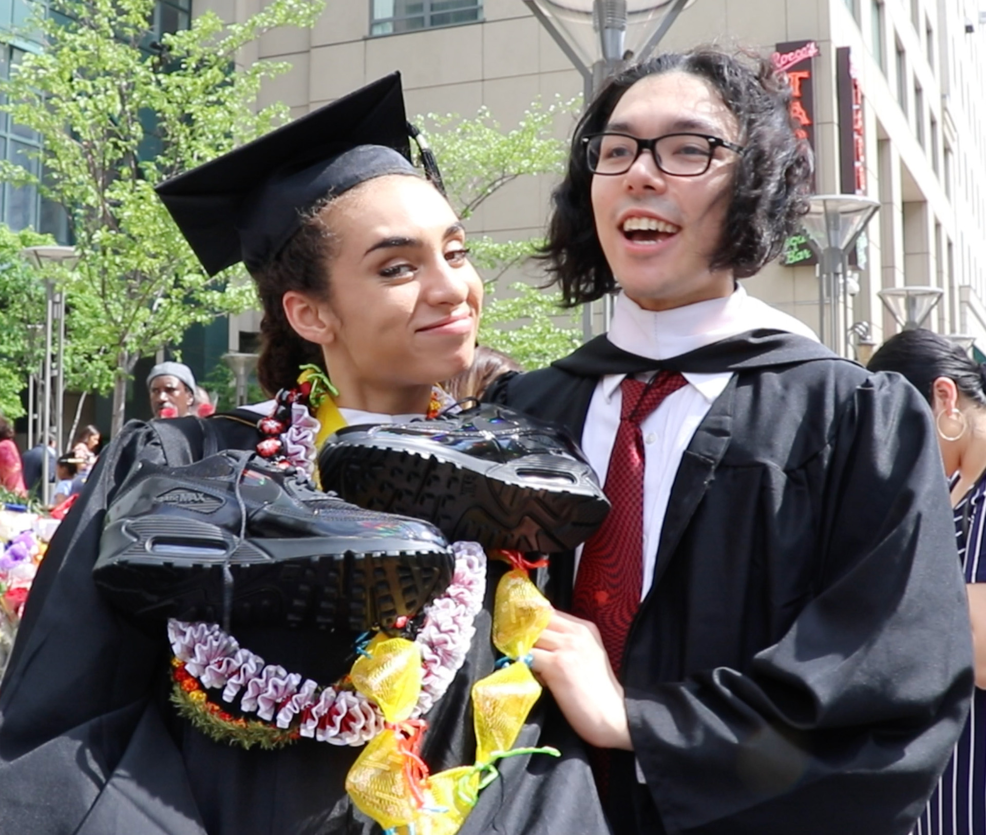 Michelle Darris with friend and fellow graduate Elliot Sang.