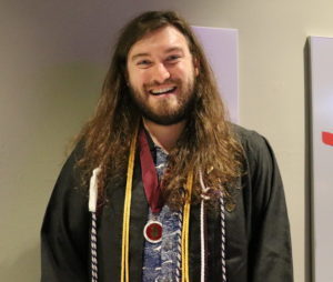 Male student with long hair.