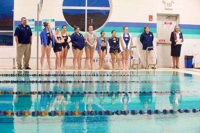 SJC Long Island's swim team with Coach Bardenberger.