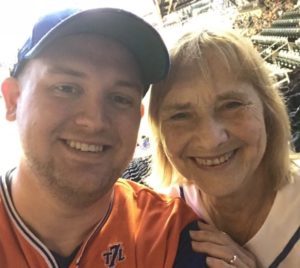 Two people at a ballgame.