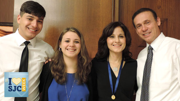 Cara (second to right) with her husband (right), daughter and son.