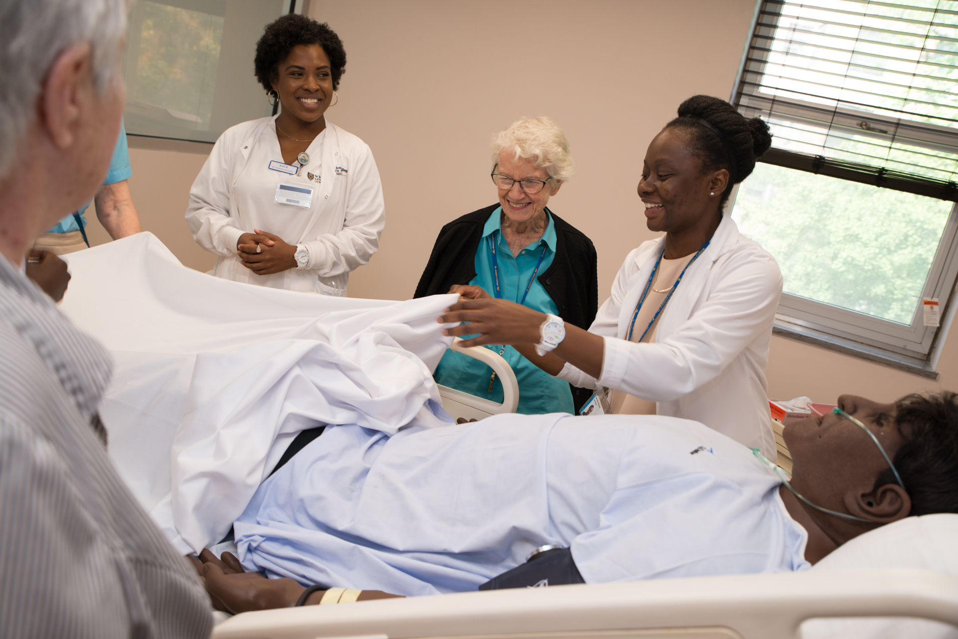 S. Margaret Buckley with nursing students.