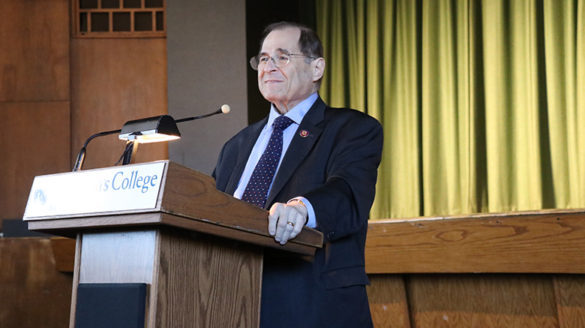 Congressman standing at a podium.