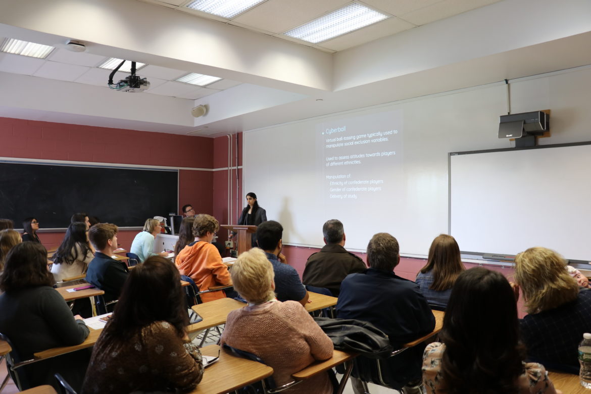 Simran Kaur presenting.