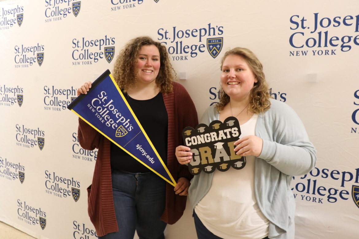 SJC Long Island seniors at Cap and Gown Pickup in 2019.