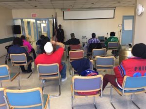 Classroom setting with students seated.