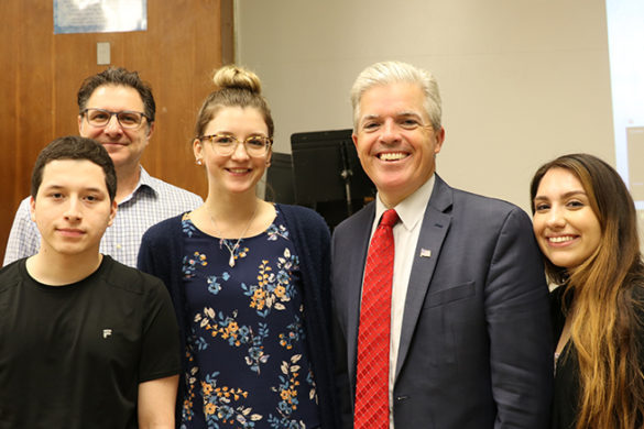 County Executive Steve Bellone with SJC Long Island faculty and students.