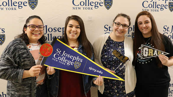 SJC Long Island seniors at Cap and Gown Pickup in 2019.