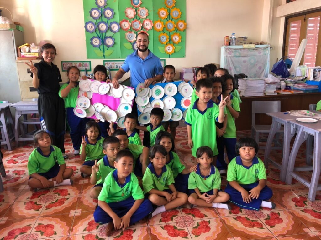 John Davis with his students in Cambodia.