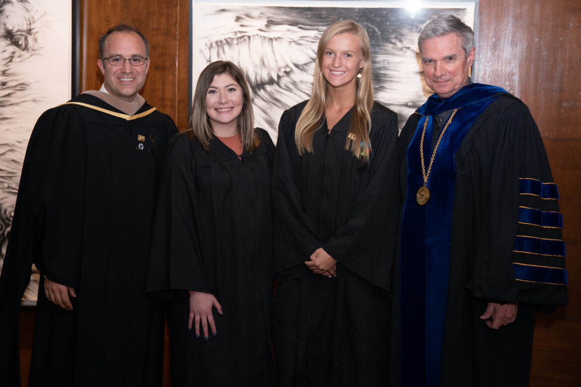 Dr. Boomgaarden and executive director of student life with members of the SGA.