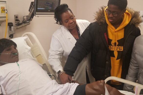 Students in nursing lab.