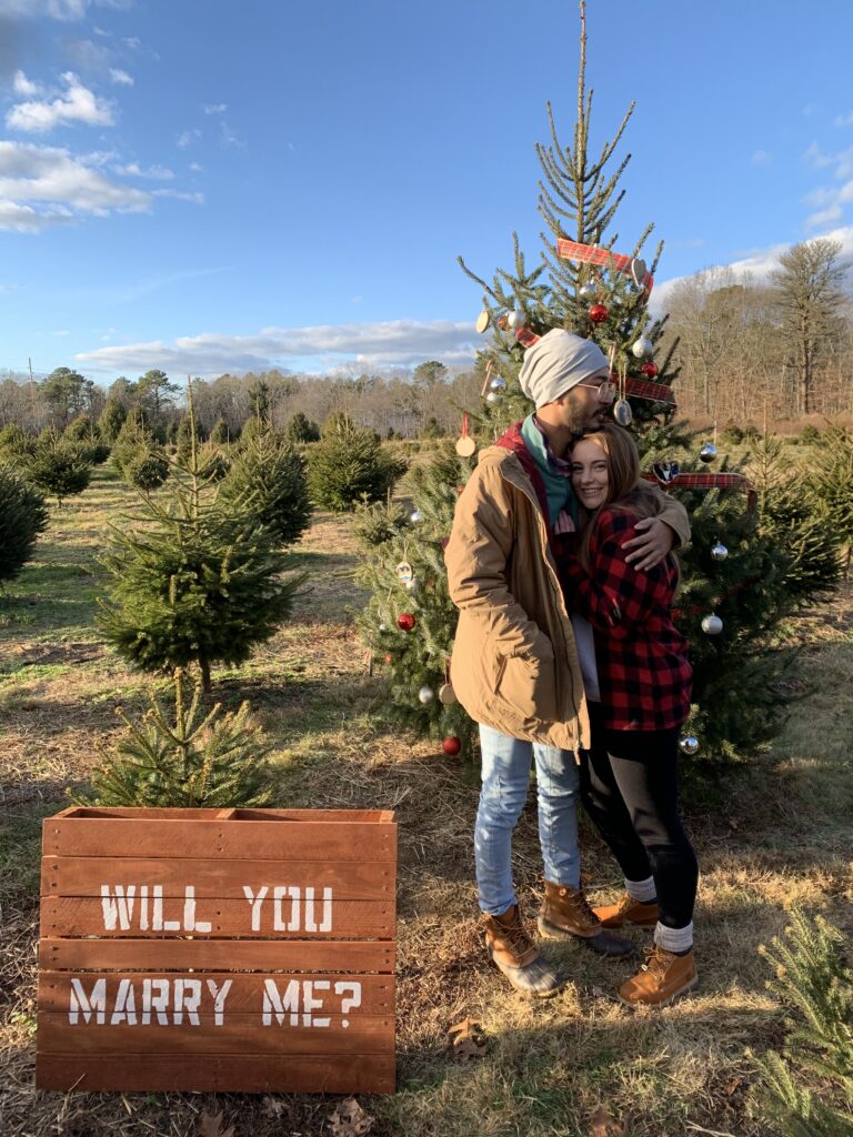 Christopher and Jordan at the tree where they got engaged.