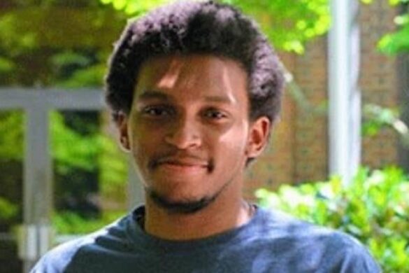 Student smiling on campus