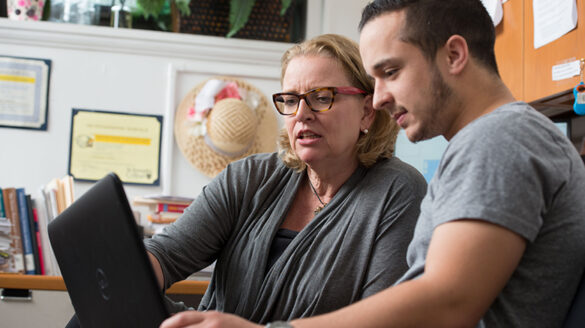 Dr. Treboux working with a psychology major on research.