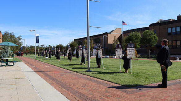 This year's Orientation team leaders line up outside to welcome new students during a virtual Investiture Ceremony.