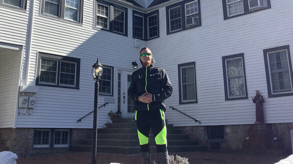 Ronan O'Brien in front of Hope House Ministries.