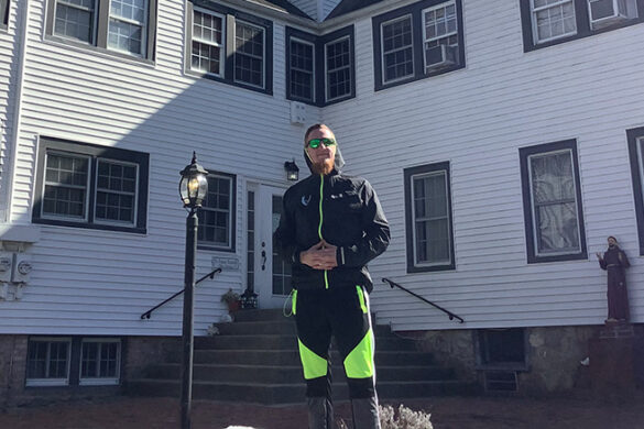 Ronan O'Brien in front of Hope House Ministries.