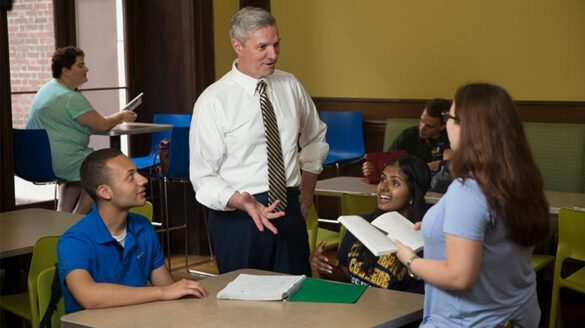 dr. boomgaarden talks to students