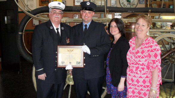 Lieutenant Walter J. Nelson Jr. with his son Kristofor, daughter Pia and wife Mary.