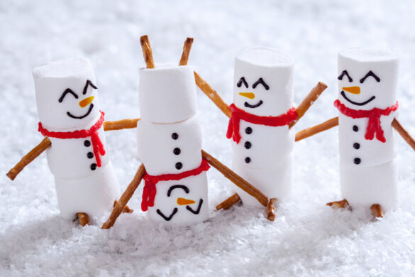 Festive holiday picture featuring food snowmen.