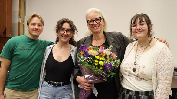 Dr. Dominique Treboux with former students.