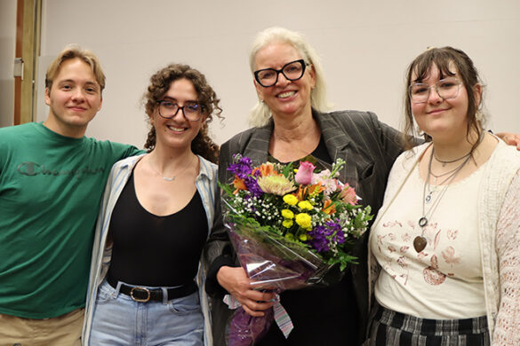 Dr. Dominique Treboux with former students.